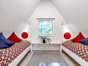 Postel nebo postele na pokoji v ubytování Holiday Home Ferienhaus Bude 92 by Interhome