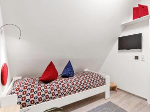 Postel nebo postele na pokoji v ubytování Holiday Home Ferienhaus Bude 92 by Interhome