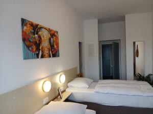 Letto o letti in una camera di Hotel u Budvaru