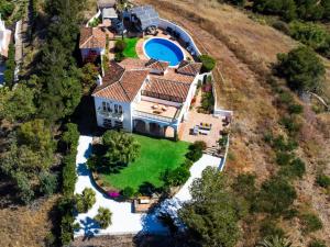 an aerial view of a house with a swimming pool at Villa Atardecer by Interhome in Torrox Costa