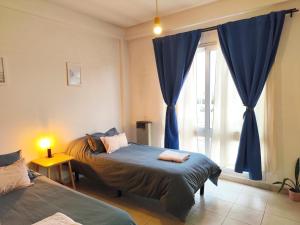 En eller flere senge i et værelse på Estación Velez Cipolletti