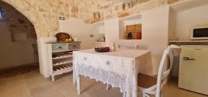 Η κουζίνα ή μικρή κουζίνα στο Pietre Vive Trulli del Salento