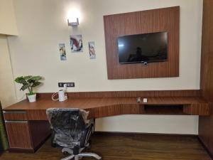 TV a/nebo společenská místnost v ubytování Orla Homes