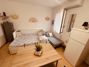 Postel nebo postele na pokoji v ubytování Le studio du Port Place adultes gratuite pour la réserve africaine de sigean