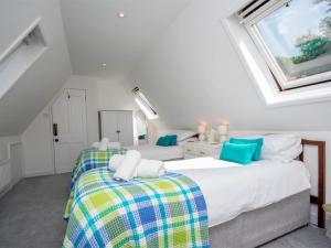 Ένα ή περισσότερα κρεβάτια σε δωμάτιο στο 4 Bed in Lulworth Cove DC182