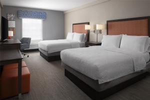 Postel nebo postele na pokoji v ubytování Hampton Inn & Suites Yonkers - Westchester