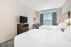 Postel nebo postele na pokoji v ubytování Homewood Suites By Hilton Schenectady