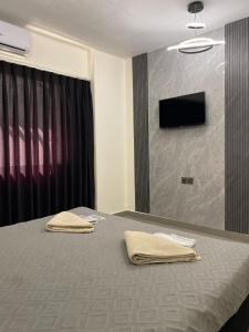Postel nebo postele na pokoji v ubytování Eden Hotel