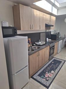 Kuchyň nebo kuchyňský kout v ubytování Tc home