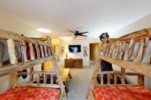 two bunk beds in a room with a ceiling at Beaver Creek West 26 in Avon