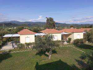 an aerial view of a house with a yard at Phyllida Guest House - M2 in Zacharo