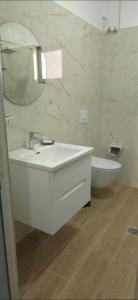 Ένα μπάνιο στο Guesthouse Mecani