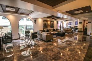 Χώρος καθιστικού στο Macjims Rest House