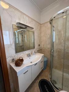 Koupelna v ubytování Gogo Apartment + 22 fotografií