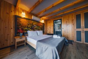 Giường trong phòng chung tại Say Resort Bungalov +60 ảnh