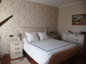 Ένα ή περισσότερα κρεβάτια σε δωμάτιο στο Casa Paz +27 φωτογραφίες