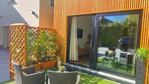 Zahrada ubytování MY Cabane -POOL HOUSE avec Sauna privée près de Bruxelles