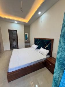 Фотография из галереи Homelystay в городе Массури +3 фотографии