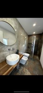 Koupelna v ubytování Casa M&N + 9 fotografií
