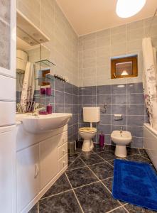 Koupelna v ubytování Ava apartmani