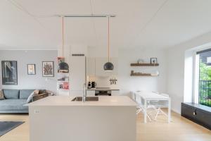 Posezení v ubytování Beach Apartment by Nestico + 20 fotografií