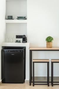 Η κουζίνα ή μικρή κουζίνα στο Marea Luxury Suites