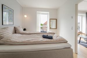 Posezení v ubytování Beach Apartment by Nestico