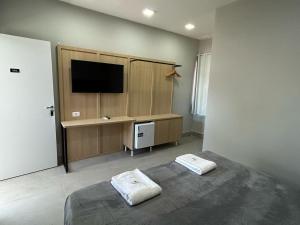 Postel nebo postele na pokoji v ubytování Hotel Castelo Branco