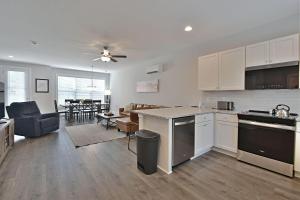 an open kitchen and living room with a dining room at Island Home Retreat in Knoxville