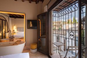 Ένα ή περισσότερα κρεβάτια σε δωμάτιο στο Calm Suites Babole