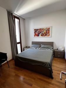 Postel nebo postele na pokoji v ubytování Palazzo Augusteo Apartment