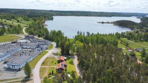 an aerial view of a lake and a building at Hus Bellö in Hjältevad