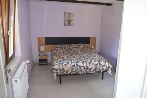 Katil atau katil-katil dalam bilik di Appartement 6 personnes dans maison alsacienne