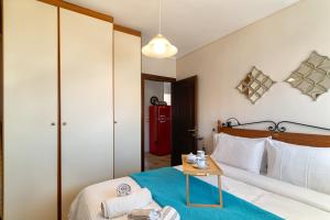 Postel nebo postele na pokoji v ubytování Apartment with marina view