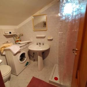 Koupelna v ubytování Domus MiTo