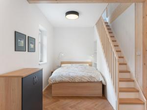Postel nebo postele na pokoji v ubytování Apartment V kapradí-4 by Interhome