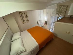 Ένα ή περισσότερα κρεβάτια σε δωμάτιο στο Leto Loft