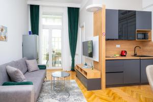 Η κουζίνα ή μικρή κουζίνα στο Titova Design Apartments