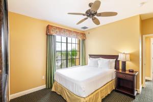 Cama ou camas em um quarto em The Berkley, Orlando