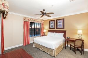 Cama ou camas em um quarto em The Berkley, Orlando