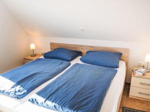 Katil atau katil-katil dalam bilik di Holiday Home Eckhuus by Interhome