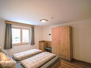 Posteľ alebo postele v izbe v ubytovaní Apartment Hohe Salve by Interhome