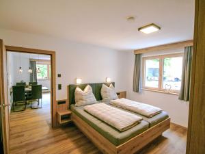 Posteľ alebo postele v izbe v ubytovaní Apartment Hohe Salve by Interhome