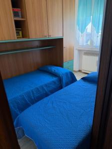 Postel nebo postele na pokoji v ubytování Viola lido adriano