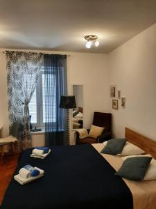 Posteľ alebo postele v izbe v ubytovaní Apartment Yes