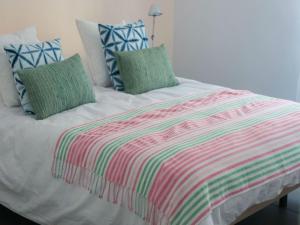 Postel nebo postele na pokoji v ubytování Hostal La Casa Sanlúcar