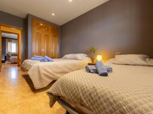 Ένα ή περισσότερα κρεβάτια σε δωμάτιο στο Holiday Home Gladiols by Interhome