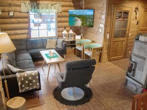 Χώρος καθιστικού στο Holiday Home Kilpis-arkki by Interhome