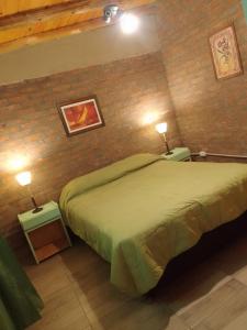 En eller flere senge i et værelse på El Espinillo