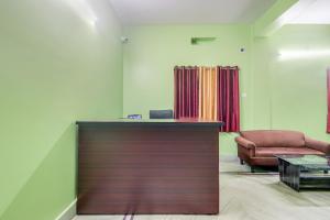 TV a/nebo společenská místnost v ubytování Hotel O M Palace